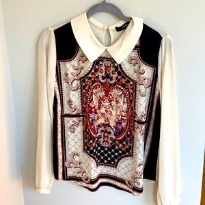 Printed Yuki blouse in size small.